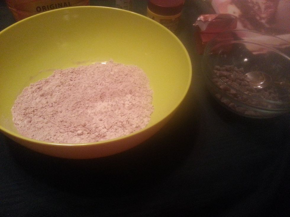 Sift the flour, cocoa powder, baking powder and salt onto a sheet of waxed paper. In a small bowl, thoroughly toss the chocolate chips with 1 teaspoon of the sifted mixture.