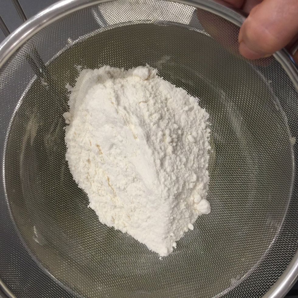 Sift the flour over the butter mixture and fold in