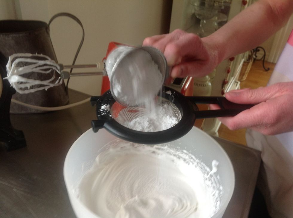 Sift the Icing sugar into the Meringue