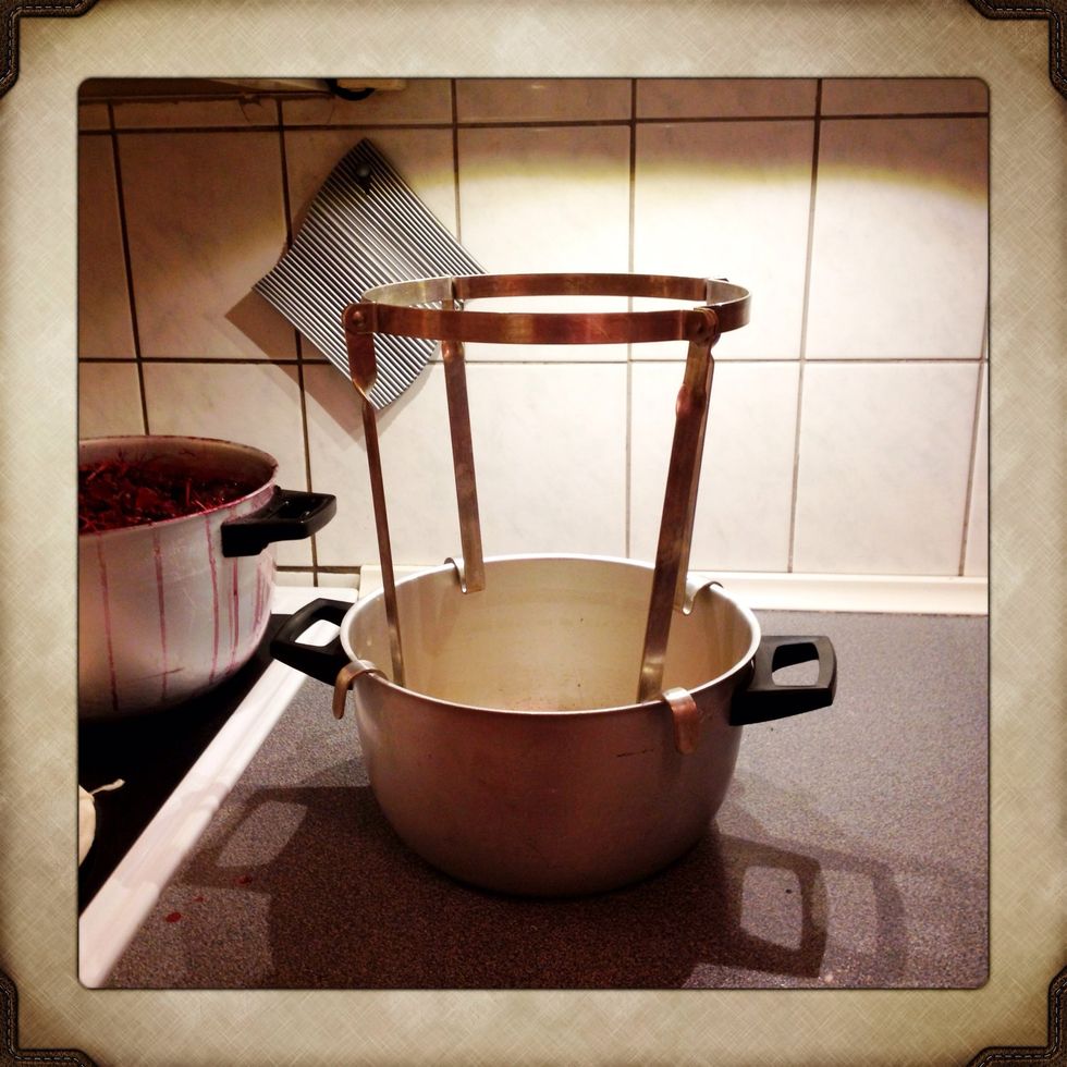 Sift the juice. In a strainer or through a cloth. E.g. with a stand like this ....