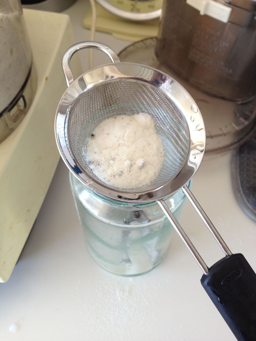 Sift the mixture over a mason jar to remove any big chunks of bean.