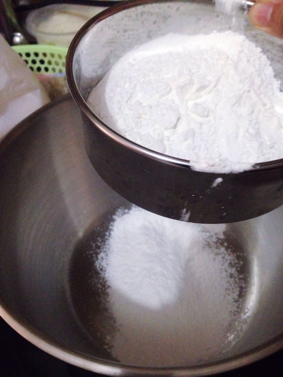 Sift together rice flour and corn flour