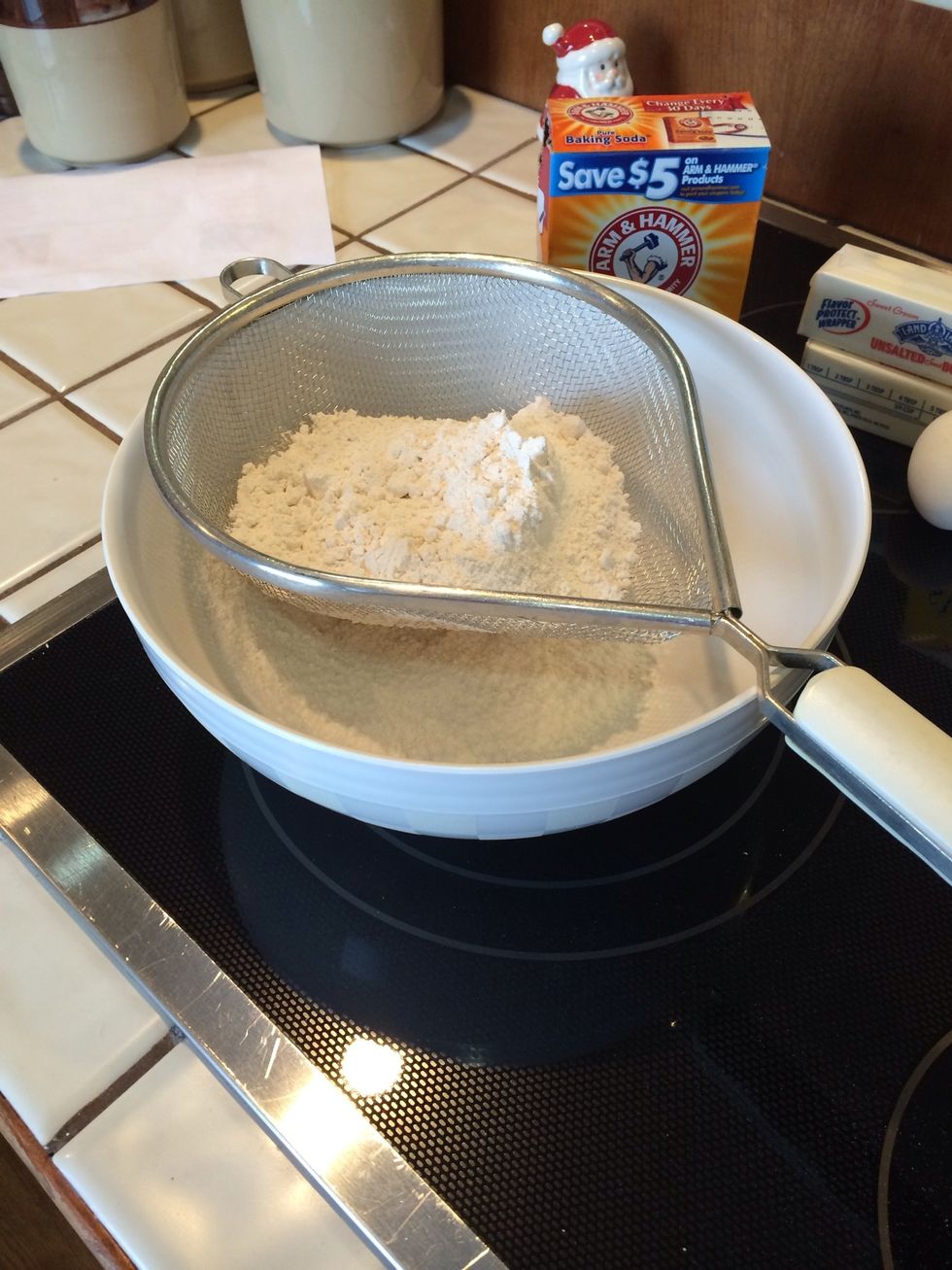 Sift together the all-purpose flour (2 \u00bd c.) with the baking soda (1tsp). This is the dry mixture.