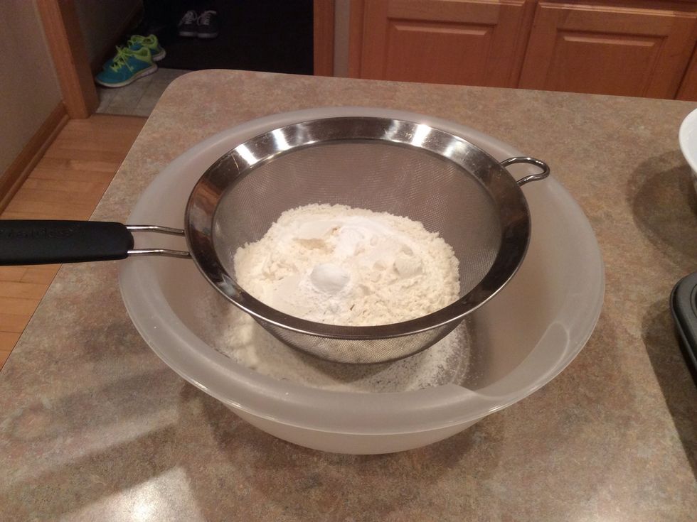 Sift together the flour, baking powder, baking soda, and salt in a large bowl