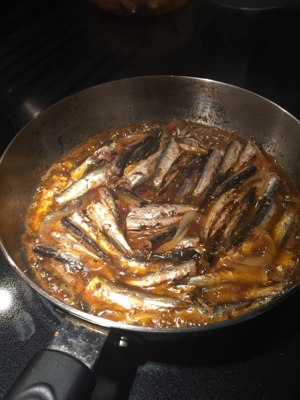 Simmer 15 minutes until sauce comes from the onions and fish