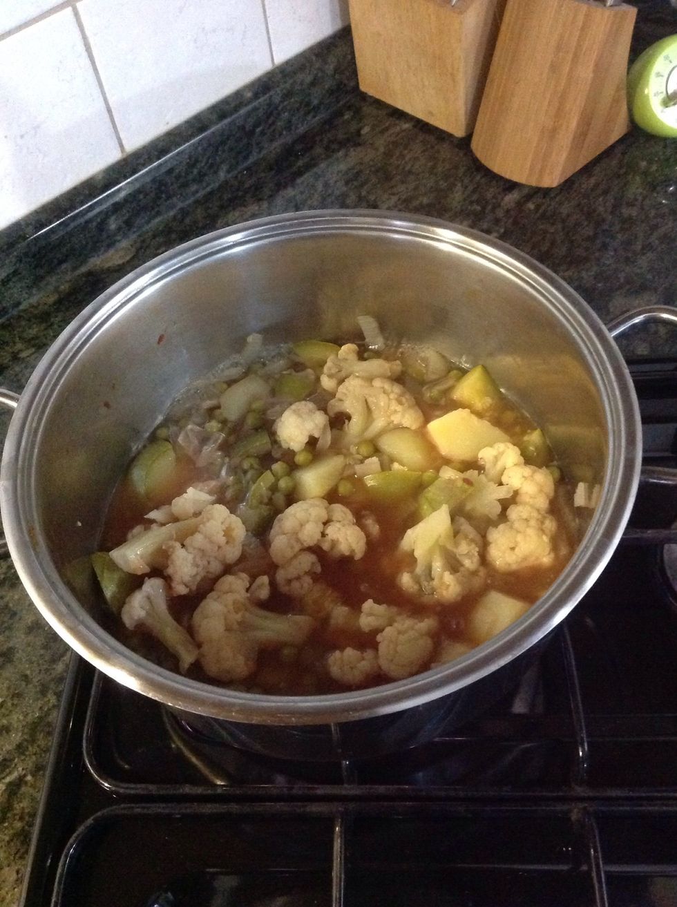 Simmer for 30 minutes till the vegetables are cooked.