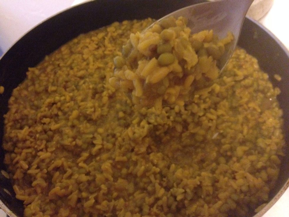 Simmer for approximately 40 minutes. It should become fragrant, stew-like rice porridge. You can add more water for a more soup-like consistency. I preferred to keep it more dry this time.