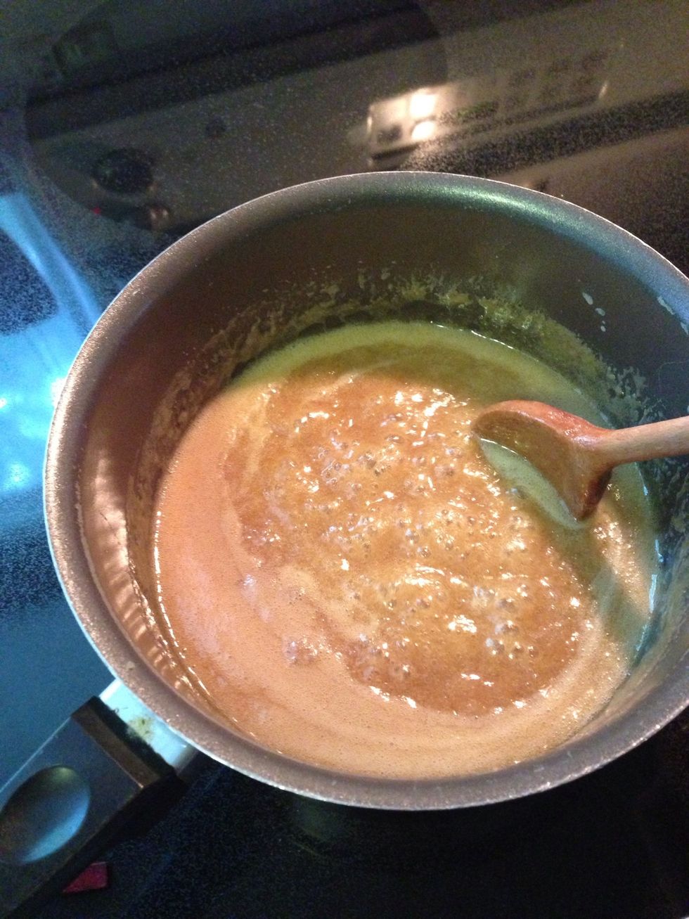 Simmer mixture until it thickens and turns a dark golden; ~8 mins. Stir occasionally.