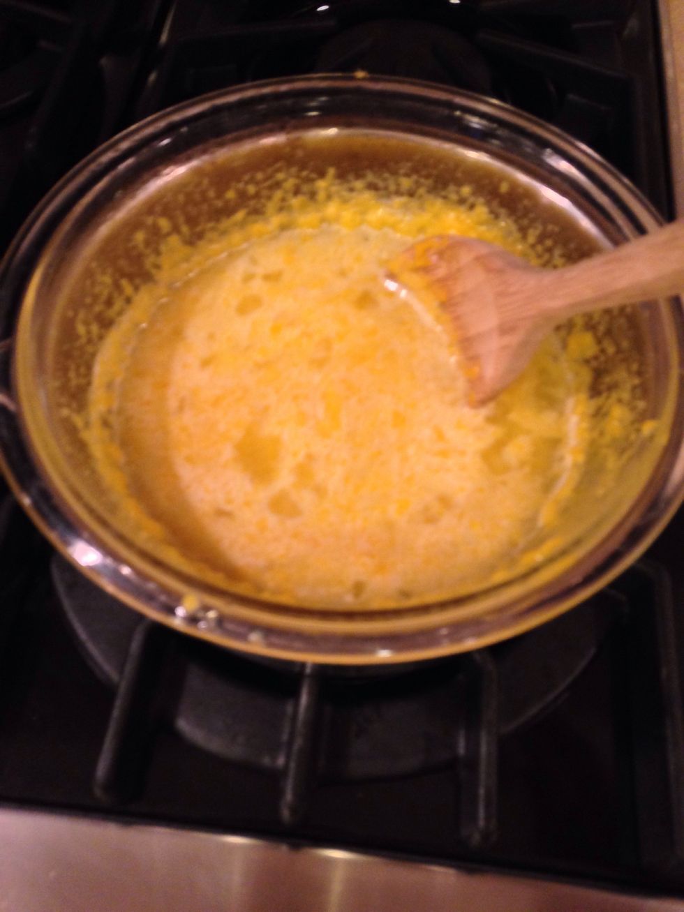 simmer (NOT BOIL), around one or two inches of water in a shallow pan. place the heat proof bowl in the water and stir continuously with wooden spoon for about 12 minutes until it's pudding-like.