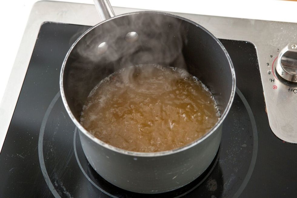 Simmer over medium heat for 15-20 minutes, until the cider is reduced to about 1/2 a cup. Remove cloves and refrigerate.