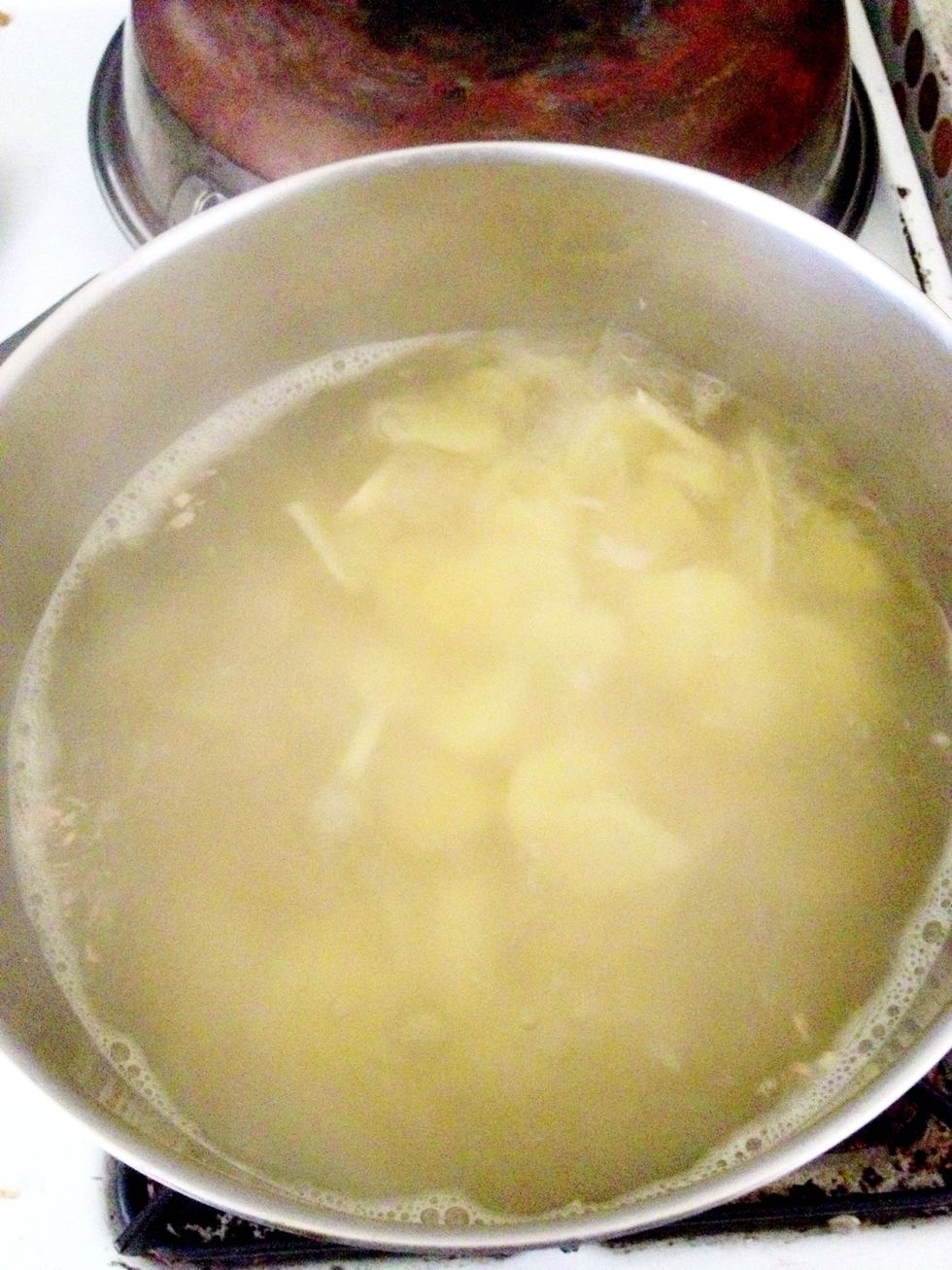 Simmer the ginger water for 5 minutes.