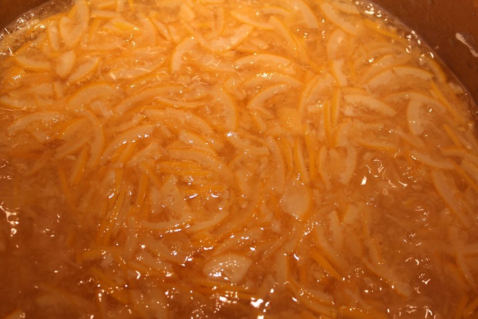 Simmer the mix for 25-40 minutes, or until the fruit is soft and turning opaque. Add sugar and bring back to a rapid boil, stirring often. Insert thermometer; stick dinner plate in freezer.