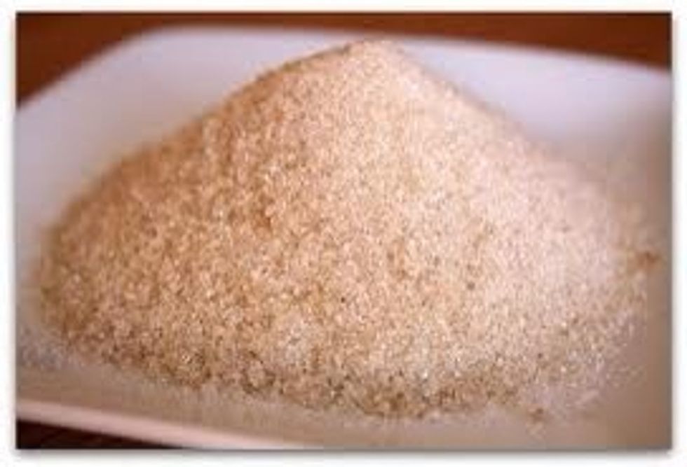 Simmer the mixture for about five minutes until you see the sugar dissolved and you can smell the ginger.