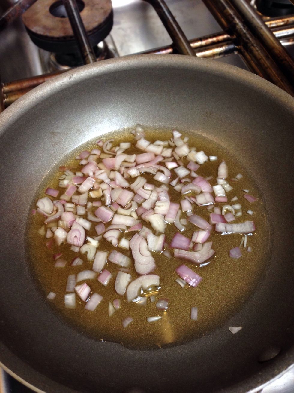 Simmer the shallots in the vinegar and reduce by half.