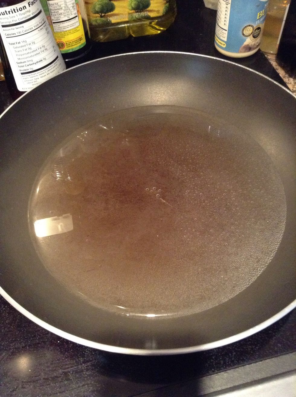 Simmer water in sauce pan.