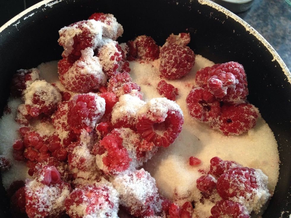 Simmer your fruit to mush it down. After a couple of minutes add the sugar, stir and let it all melt.