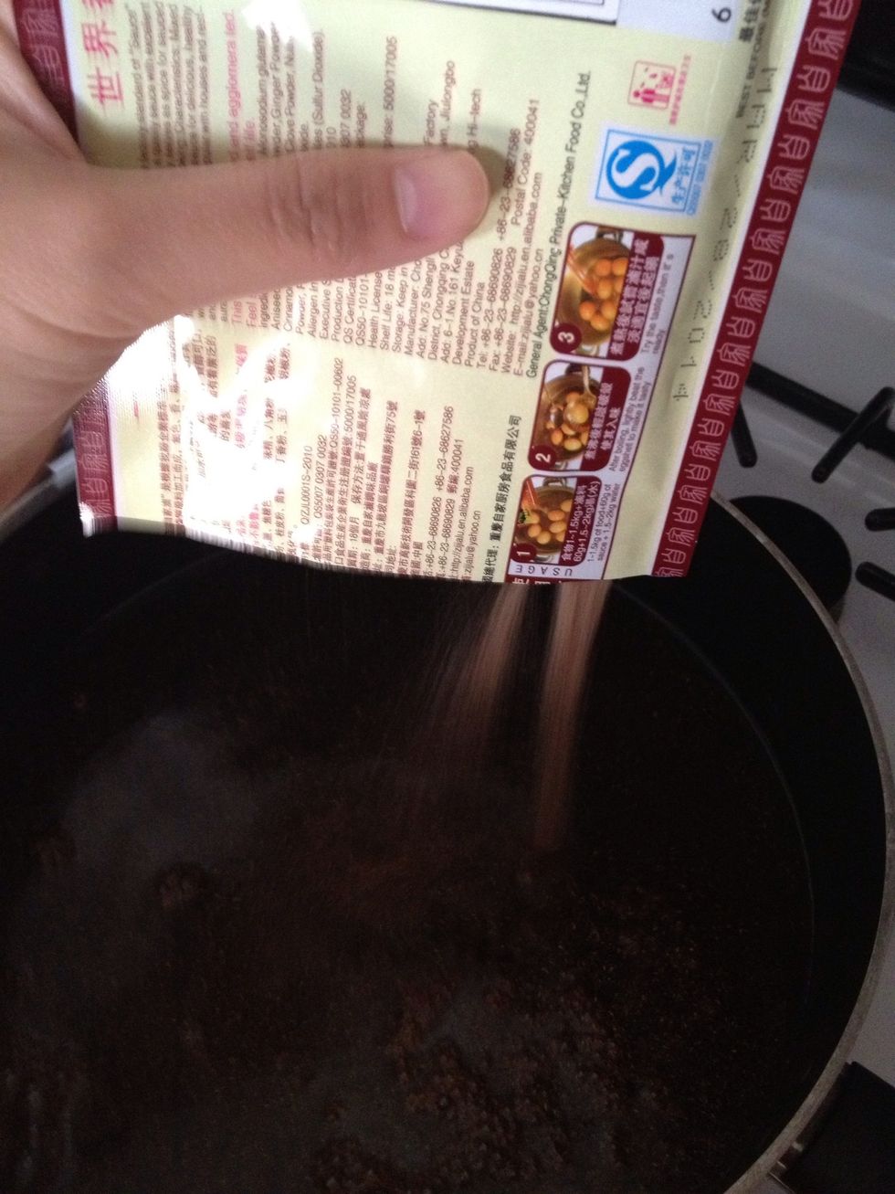 Simmered at medium heat. The simmering let the spiced fluid to seep into eggs and marinated inside their eggs.