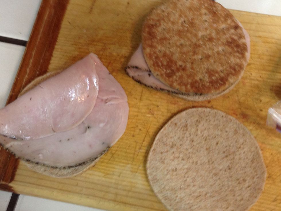 Simple add lunch meat and bread together  I made 2 of these