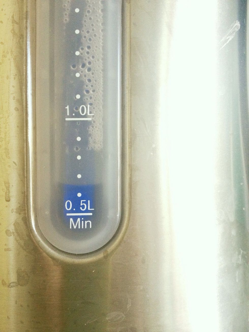 Simply boil water with a kettle (electric or stove top). If you are only making one cup you shouldn't need to boil more than 20oz to rinse the filter and pour a 16oz (Starbucks Grande) cup of coffee.