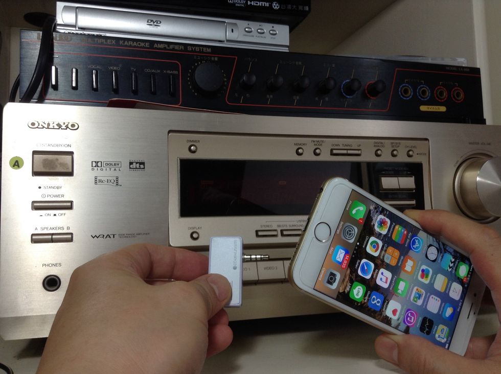Simply connect the Music Transmitter for iPhone to your audio jack on your iPhone