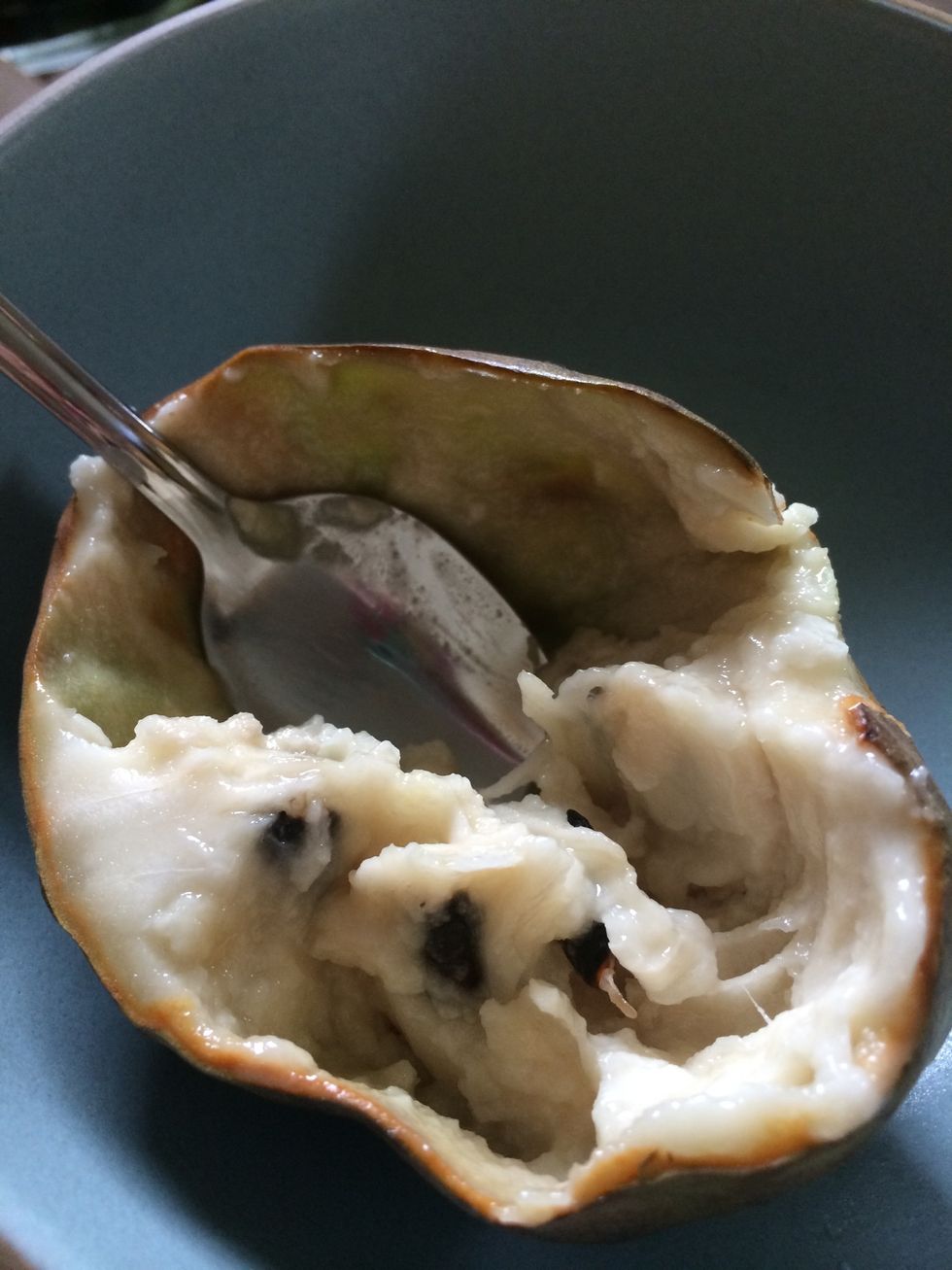 Simply cut in half and use a spoon to scoop out the delicious creamy white flesh! But don't eat the seeds!