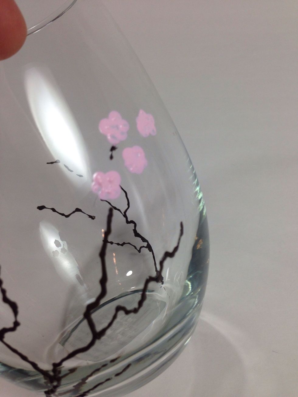 Simply dab the pencil eraser in the paint and onto the glass