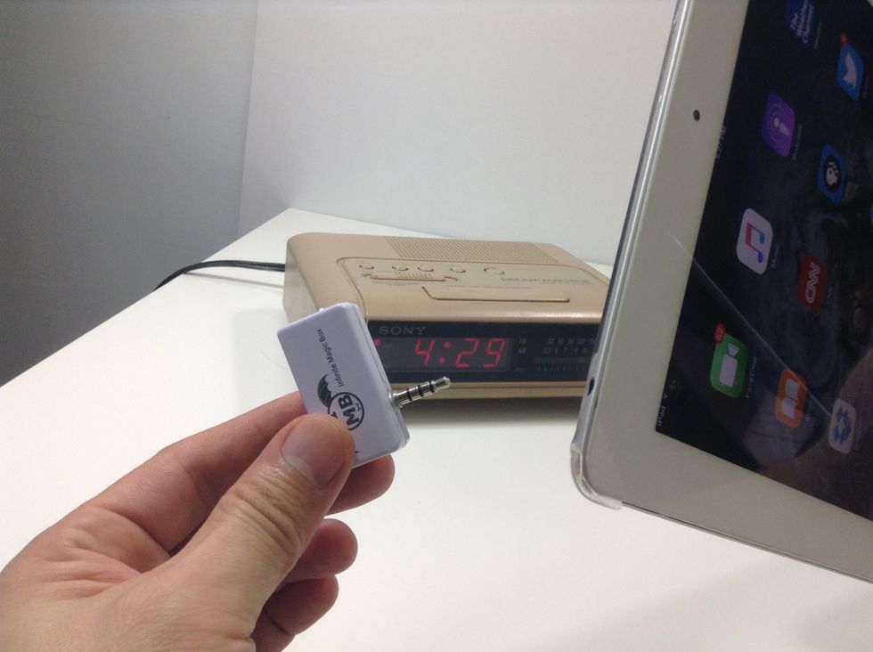 Simply plug in the music transmitter for iPhone to your iPad Air or iPad Mini's audio port for sound transmission