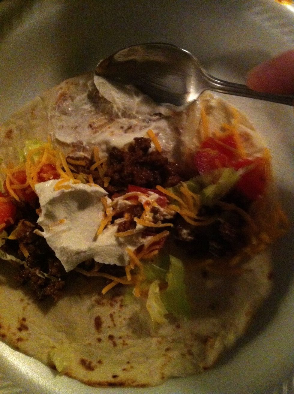 Simply spread some of your sour cream on one side.