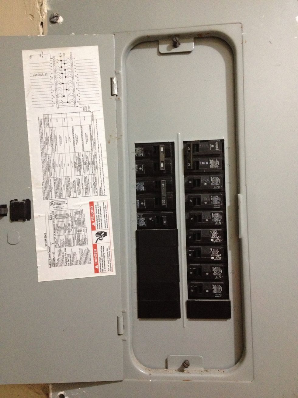 Since I couldn't put up the new mirror, I decided to go ahead and install the light fixture.  First thing, make sure that the power is off.  Your fuse box is probably in your garage or utility room.