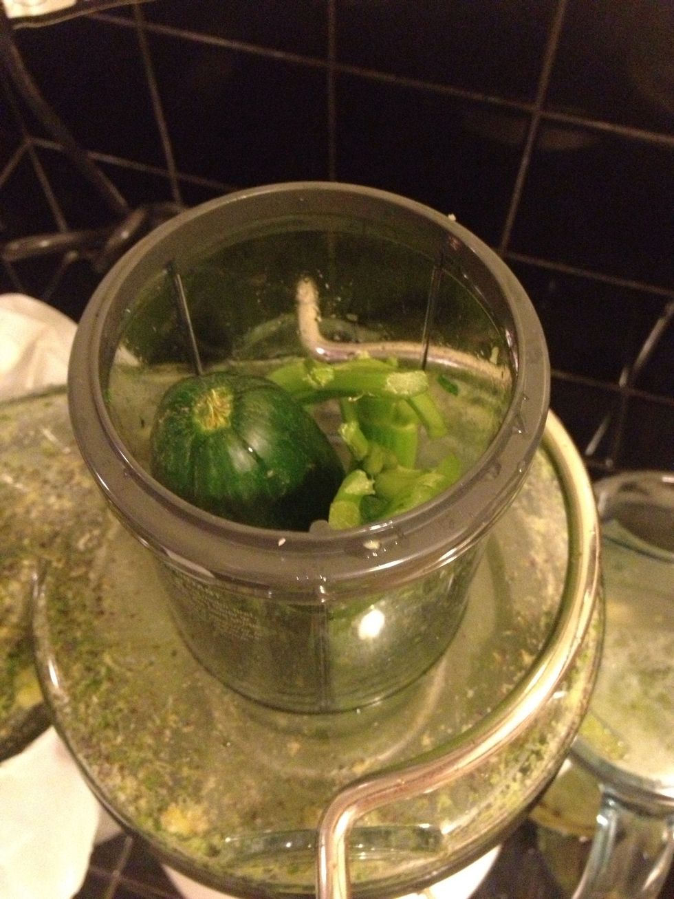 Since leafy greens have a lot of pulp, I usually go with the next vegetable or fruit with the most juice. This will help loosen any juices from the fibers or pulp. Cucumber and celery ready to go.