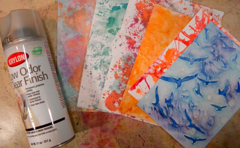 Since the Inks are not permanent on Yupo's non-porous surface, I sprayed several coats of Krylon Crystal Clear fixative before adding any other media. Let the coats of fixative dry in between.