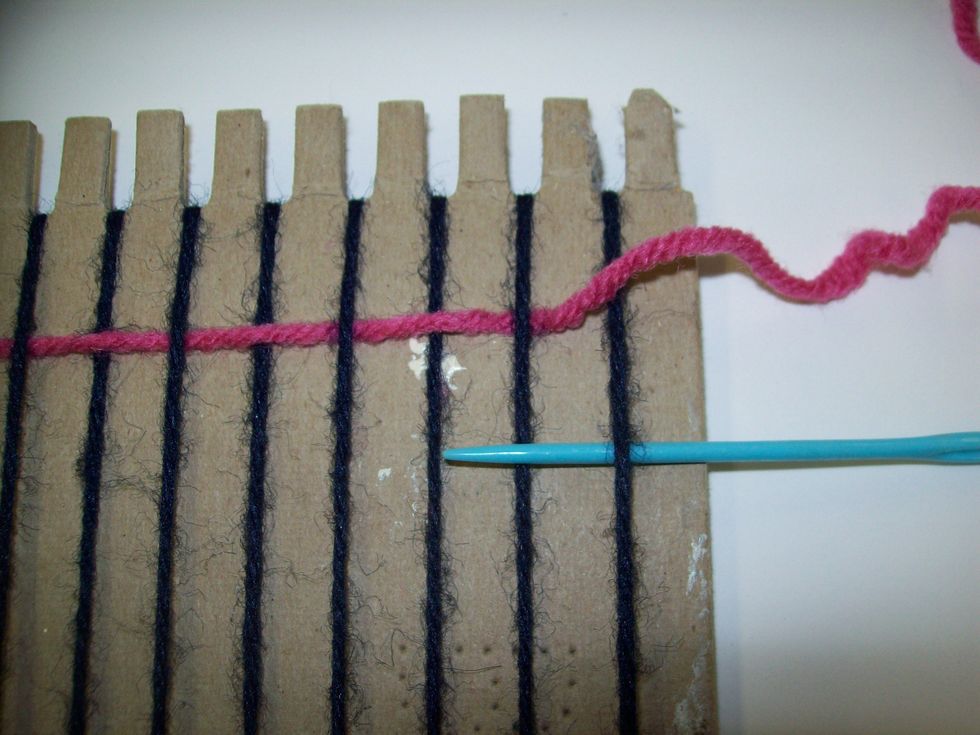 Since the weft went OVER the last warp, it will come back through UNDER that same warp.