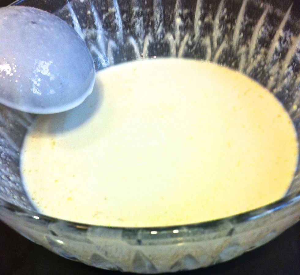 Since there is no baking powder added, we are depending on the beating process to incorporate air and fluffiness to the pancakes. Then fold in the melted butter. And that's it to make the batter.