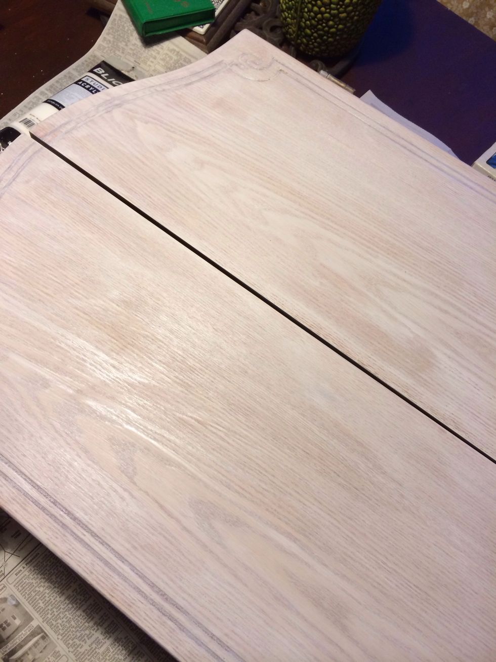 Since we sanded, the wood will absorb the paint especially the whitewash. You'll probably have to do more than one coat. I know you're ready to do the design, just chill. Doing it right ain't easy.