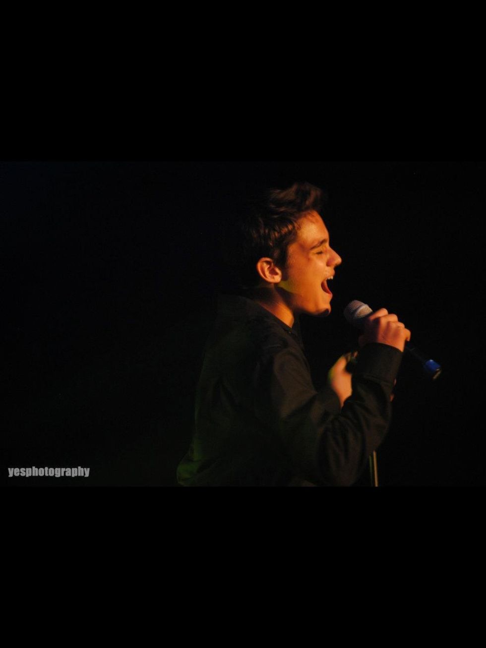 Singing. I'm eating my mic. Lol