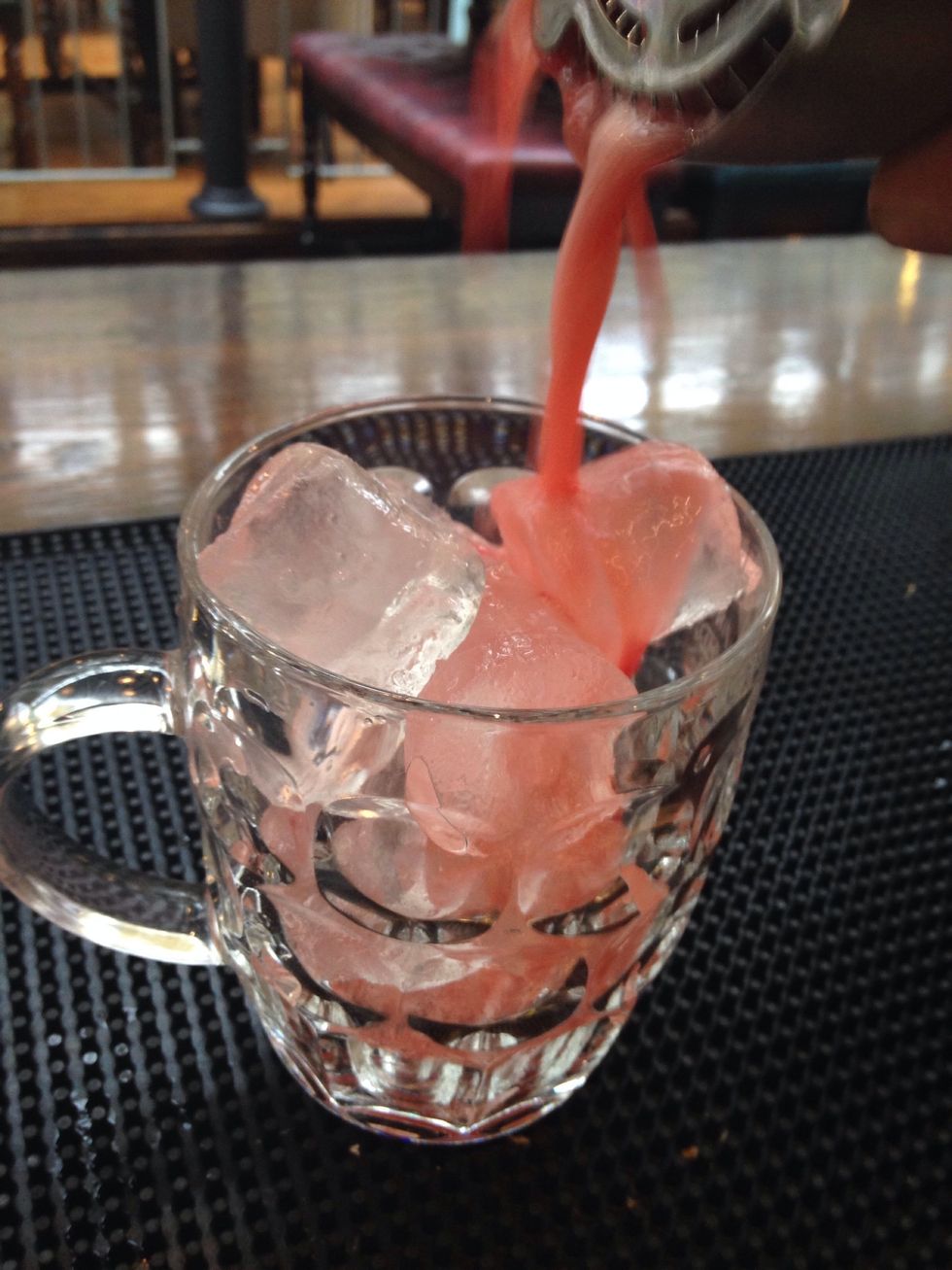Single strain into a beer glass of your choice packed full of ice.