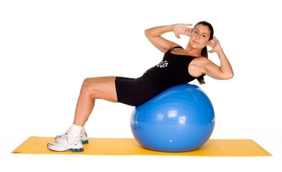 Sit and twist or stand and twist: do about 30 reps to start off with and when our stronger you can increase if you like (don't do standing if you have back problems)