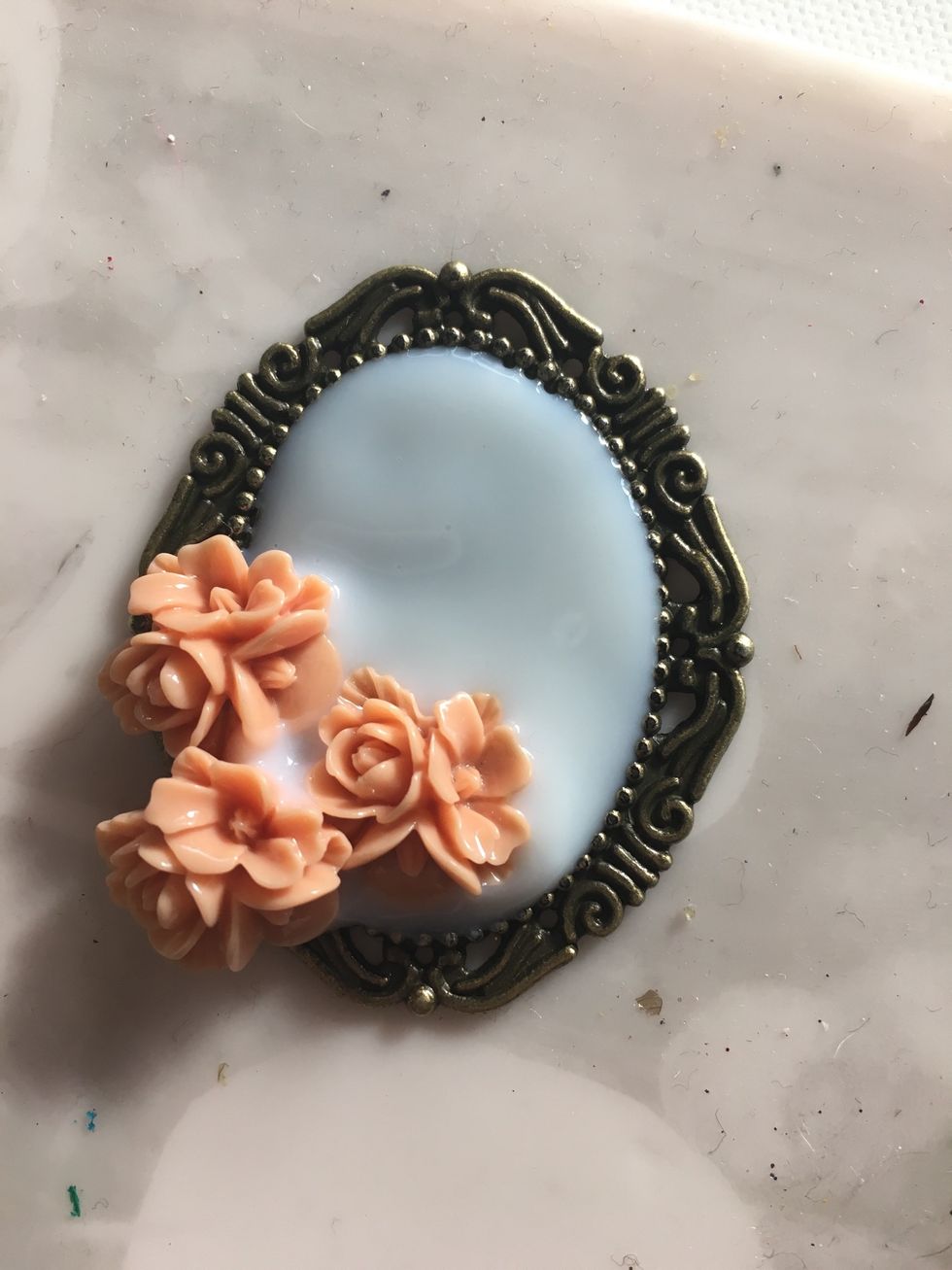 Situate your BBS Resin Flowers to your liking in your Liquid Glass. One of mine sits on the edge of the frame, so I made sure to add liquid glass under it to secure it.