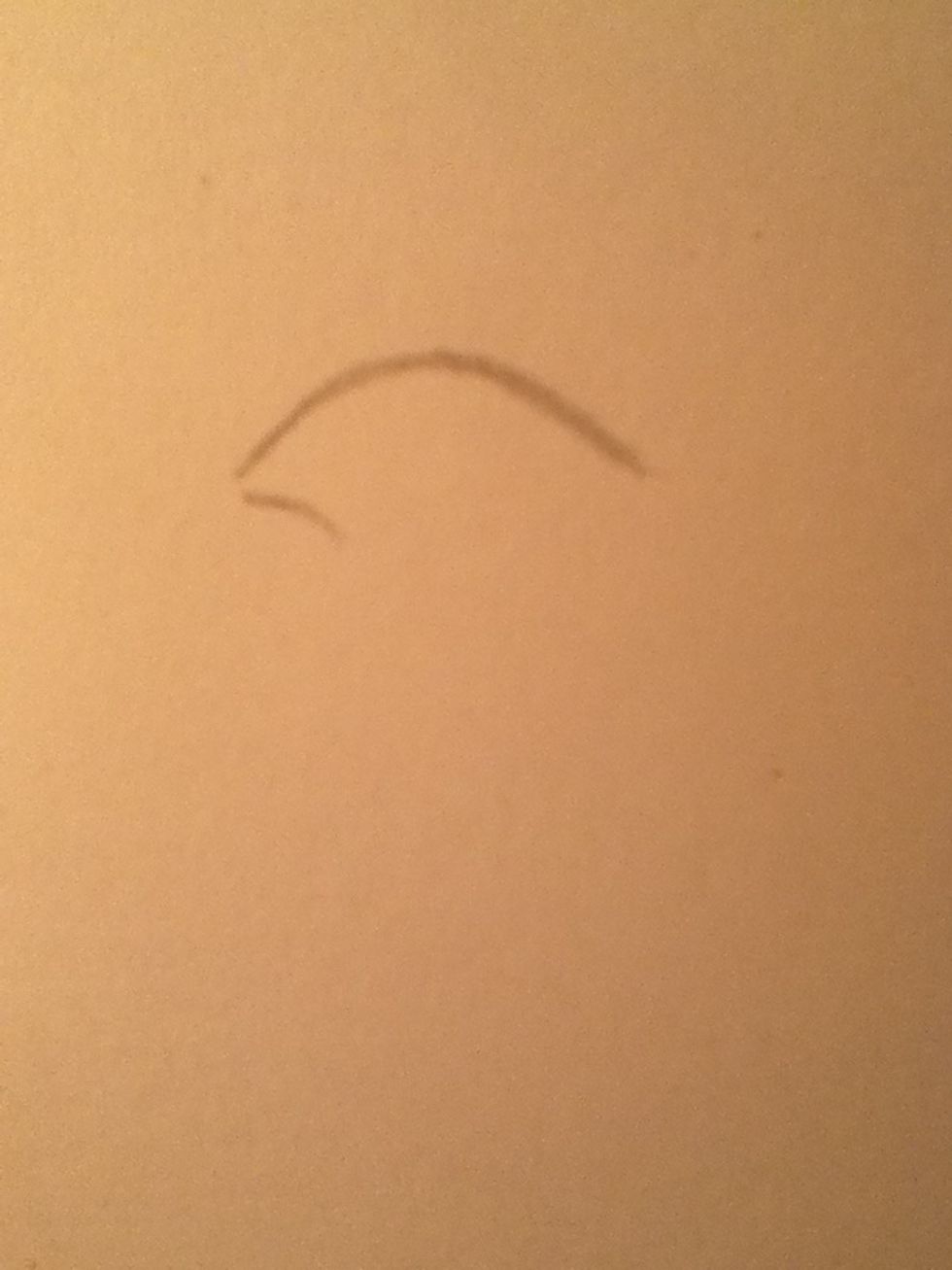 Sketch a shorter curved line underneath.