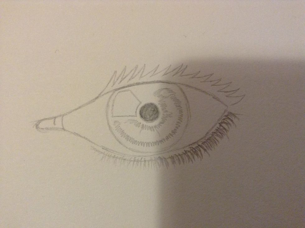 Sketch out the darker parts of the eye