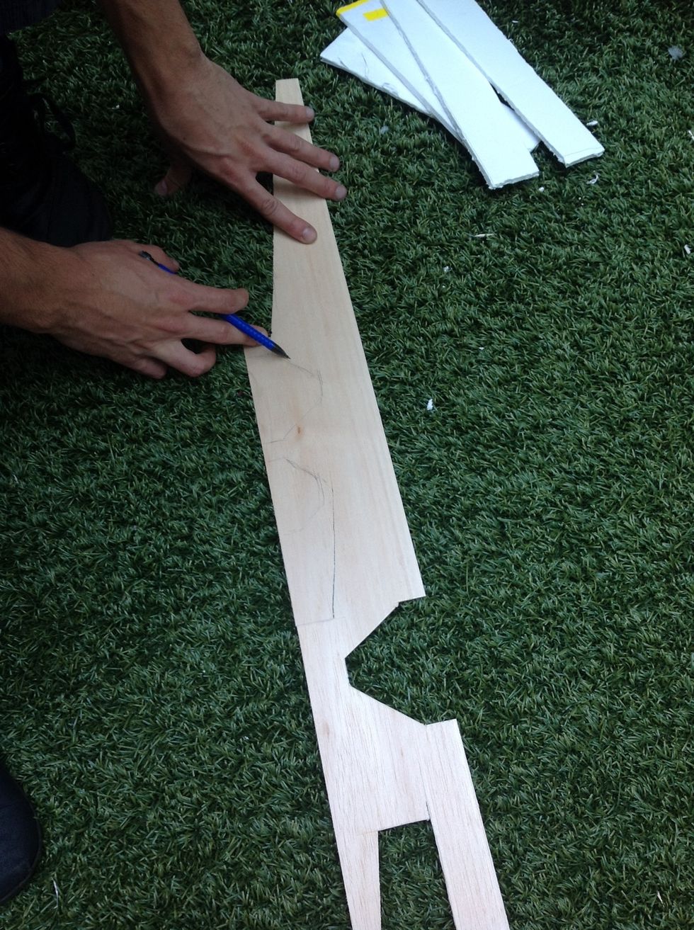 Sketch out the normal and large balsa wood tail wings and then cut them out.