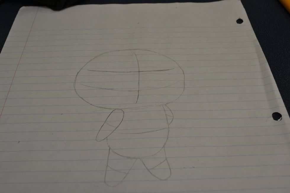 Sketch the body of your drawing in a pose, this is where you should have reference sheets to know what pose you'll do. Or a wooden human model which can be found within IKEA.