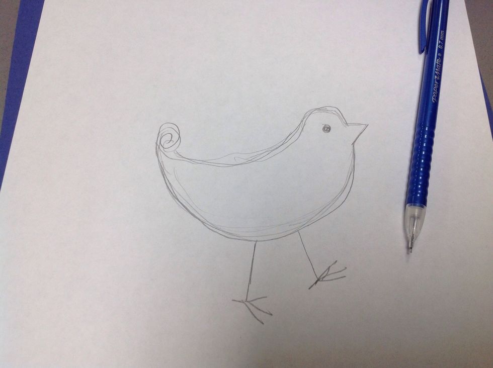 Sketch the outline of a bird on paper. Draw it the size you want your sculpture to be.