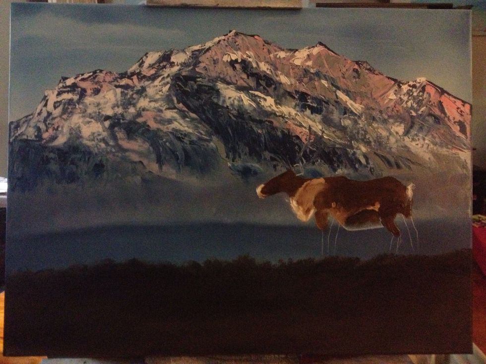 Sketch your caribou with your pinky. I used the knife to scrape away the excess paint. Start blocking in your caribou colors. Sienna, brown, and white mixes.