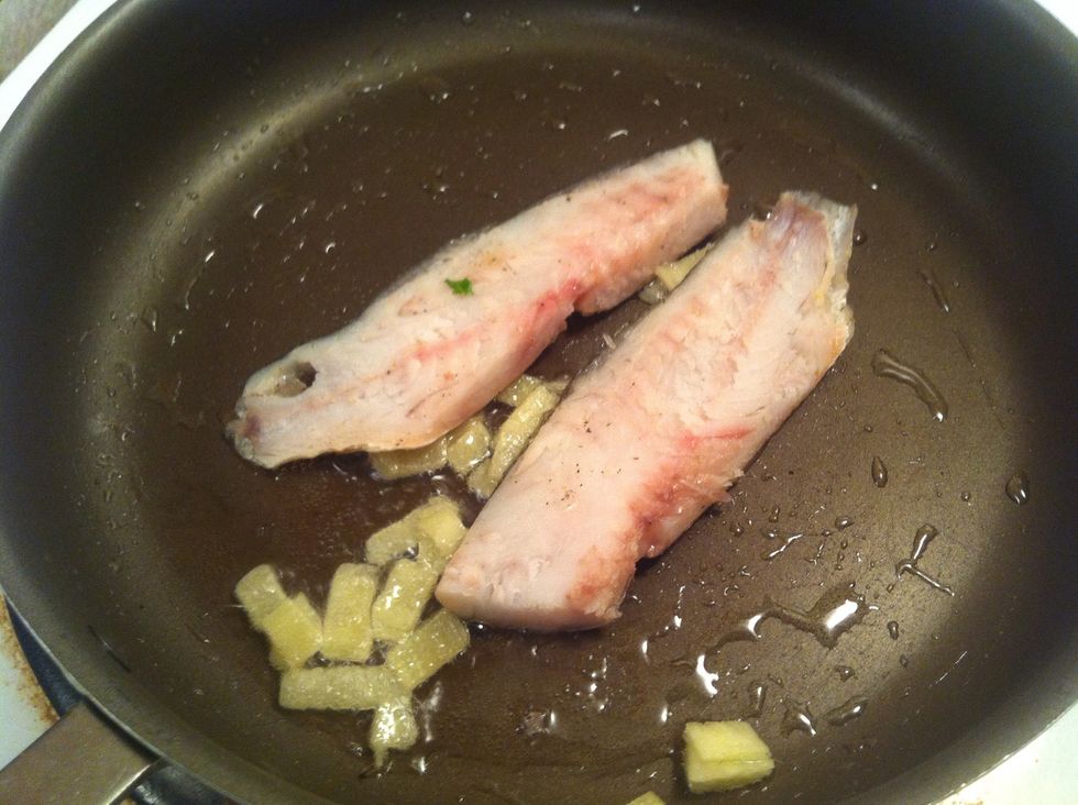 Skin side on the pan for few minute until golden brown