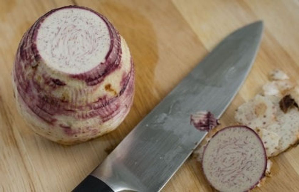Skin yam and cut to strips.  Grate the strips into pieces.