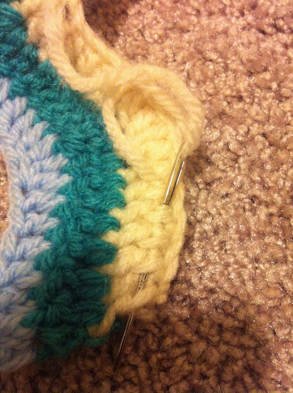 skip one loop and go all the way back. pull yarn a little thight and cut.
