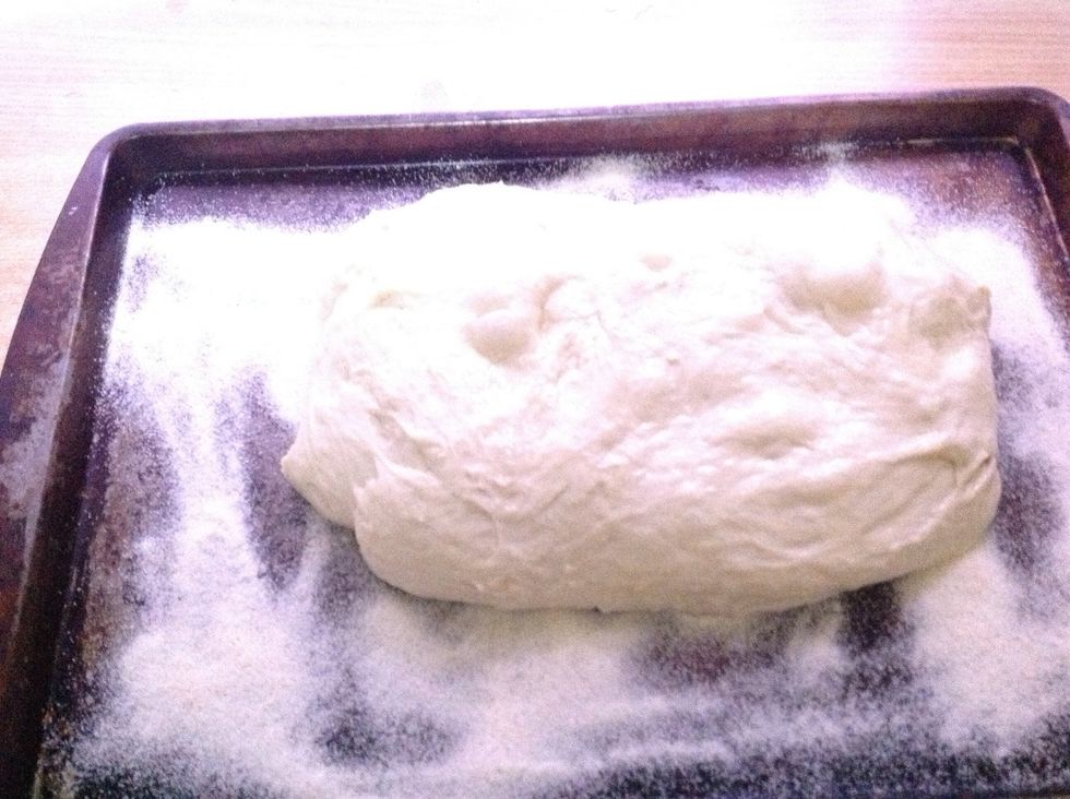 Slap your risen dough on the sheet