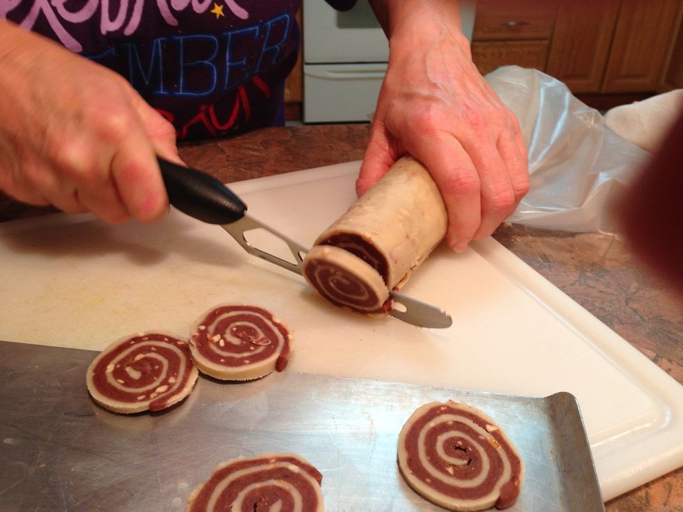Slice 1/8 - 1/4". Any sharp knife works. (I tried my new cheese knife this time but found that a simple SHARP non-serrated knife works better) If it sticks, it's helpful to dip knife in hot water.