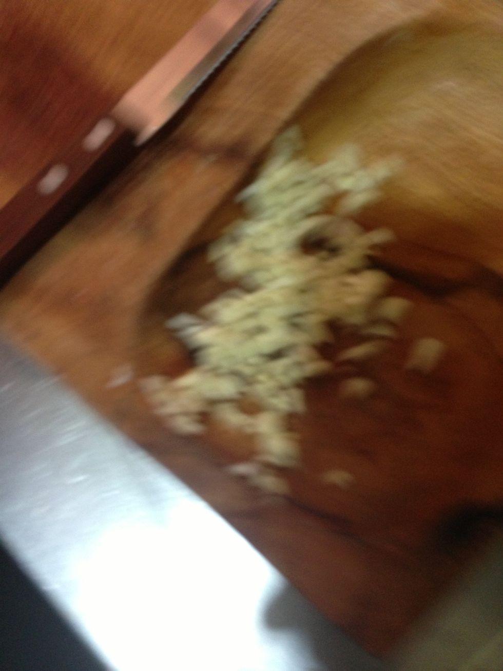Slice 2 garlic cloves